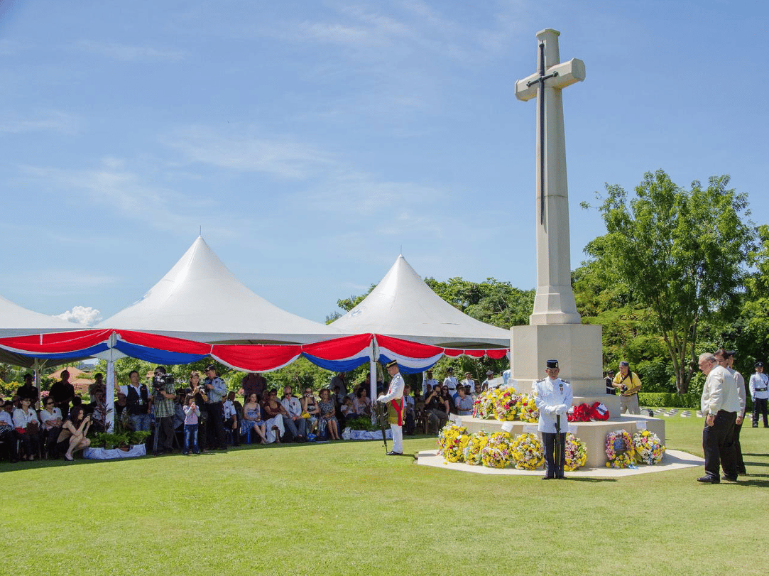 Royal Navy Sea Cadet standing guard at the war memorial during the remembrance day at Veteran Memorial Park in Labuan
